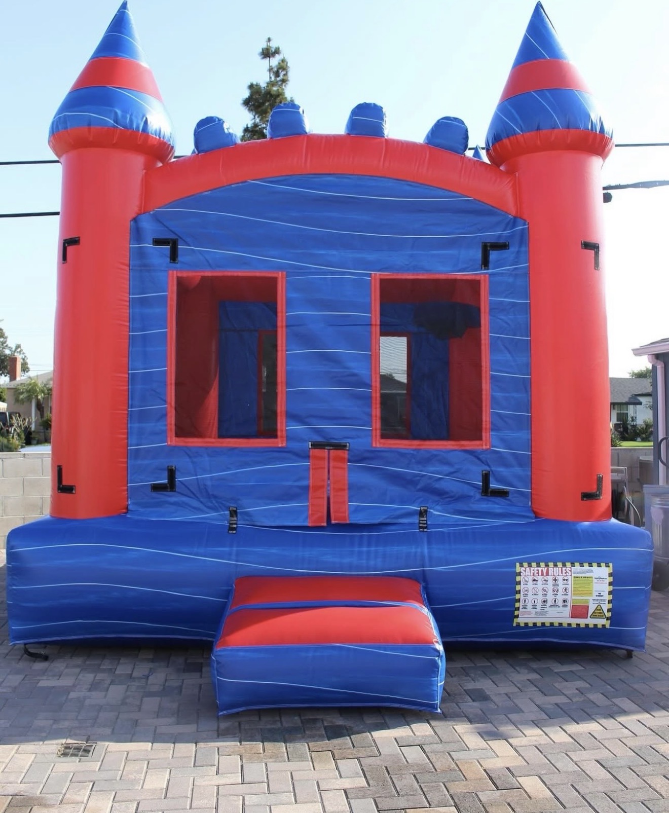 Blue & Red Bounce House with Basketball Hoop